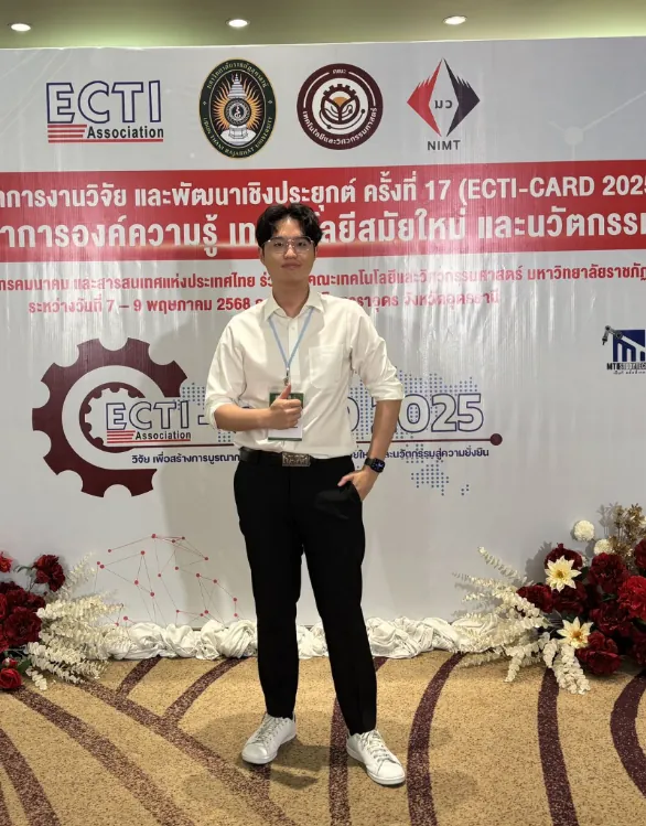 Worakorn at the ECTI-CARD 2025 conference backdrop